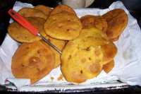 Las mundialmente famosas e incomparables "sopaipillas", suavemente dulces y con zapallo/calabazaThe world famous and incomparable "sopaipillas", mildly sweet and with pumpkin